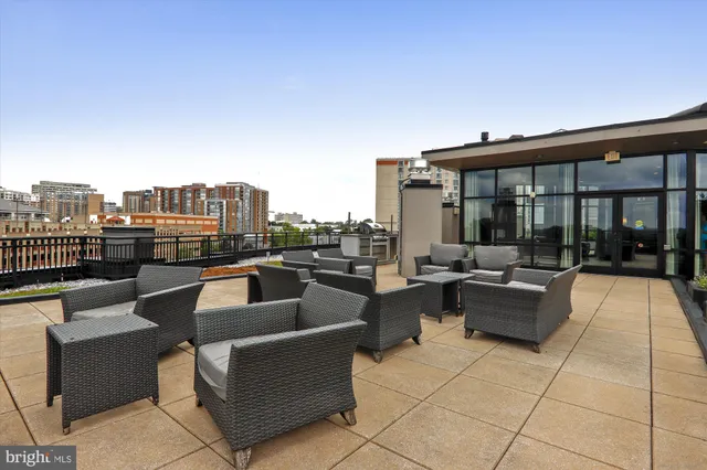 a view of a terrace with city view