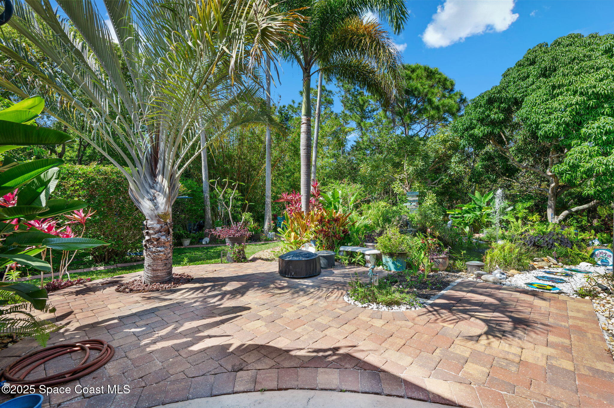 3445 Shady Run Road Melbourne, FL 32934 - Photo 54 of 100 a view of a garden with plants