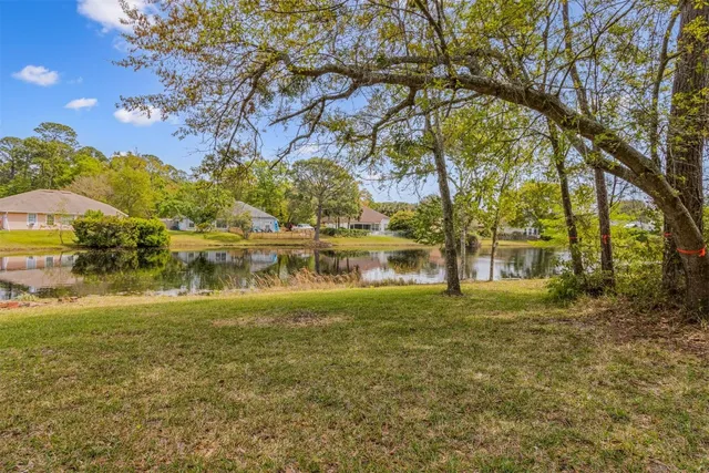 a view of swimming pool with outdoor space and seating area
