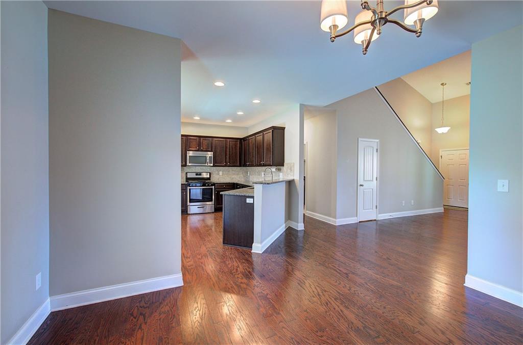 25 Winter Pointe Northwest Cartersville, GA 30121 - Photo 11 of 43 a kitchen with stainless steel appliances granite countertop a stove top oven and sink