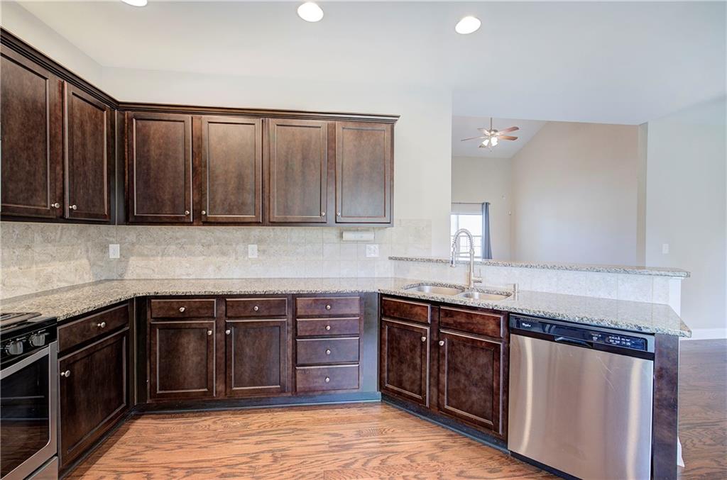 25 Winter Pointe Northwest Cartersville, GA 30121 - Photo 14 of 43 a kitchen with a sink and cabinets