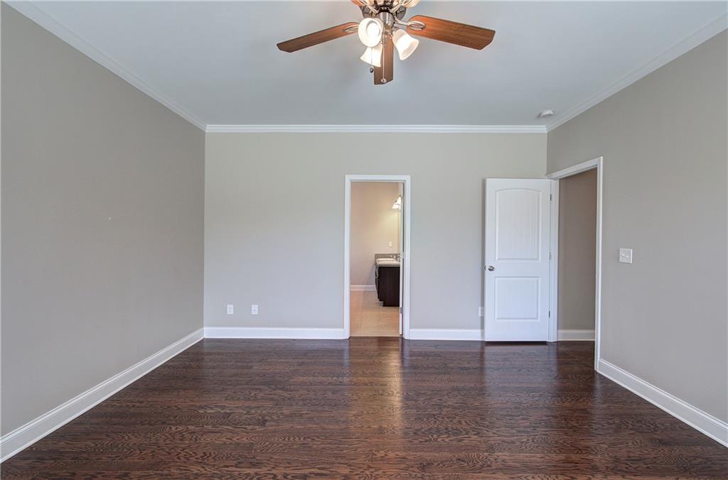 25 Winter Pointe Northwest Cartersville, GA 30121 - Photo 17 of 43 a view of an empty room with wooden floor