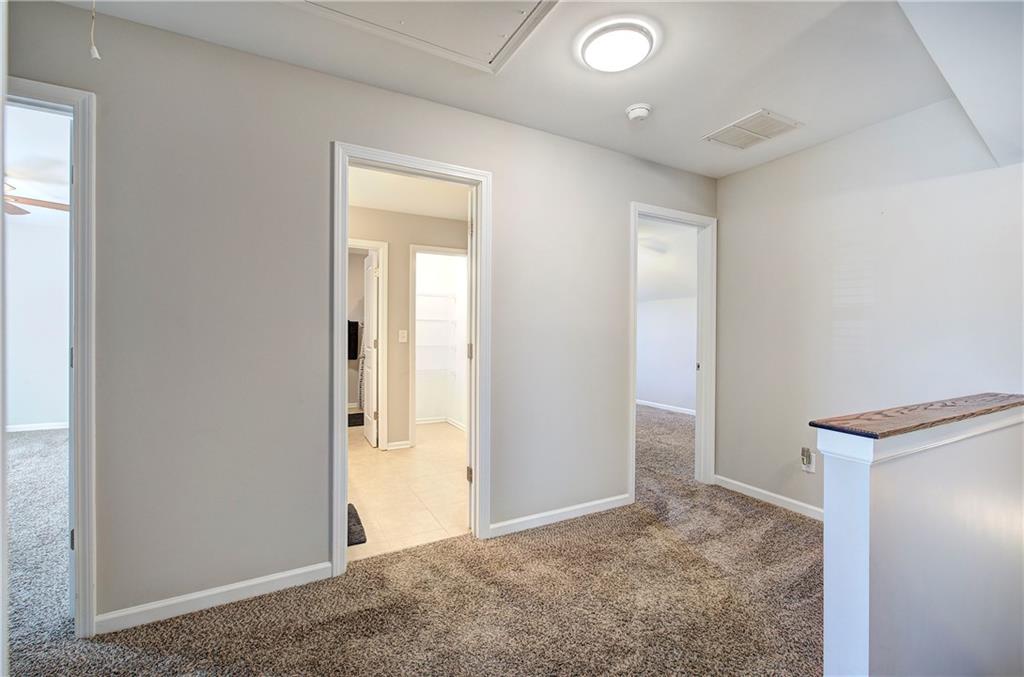 25 Winter Pointe Northwest Cartersville, GA 30121 - Photo 24 of 43 an empty room with closet and a bathroom