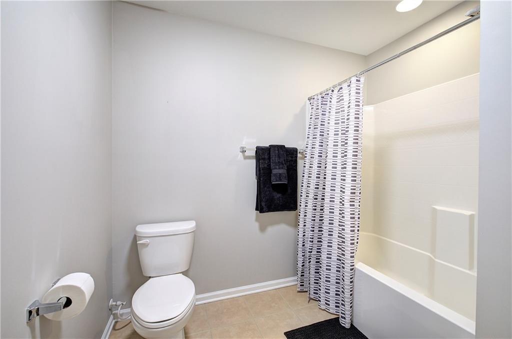 25 Winter Pointe Northwest Cartersville, GA 30121 - Photo 32 of 43 a bathroom with a toilet and a shower