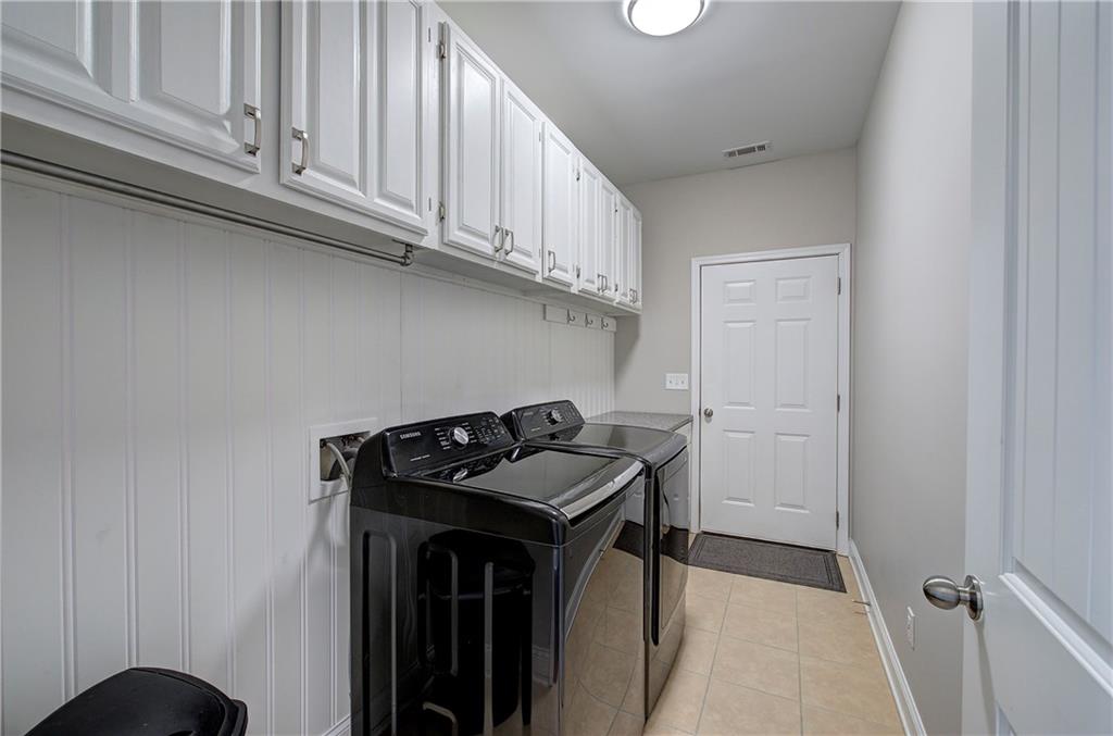25 Winter Pointe Northwest Cartersville, GA 30121 - Photo 34 of 43 a kitchen with granite countertop a sink and cabinets