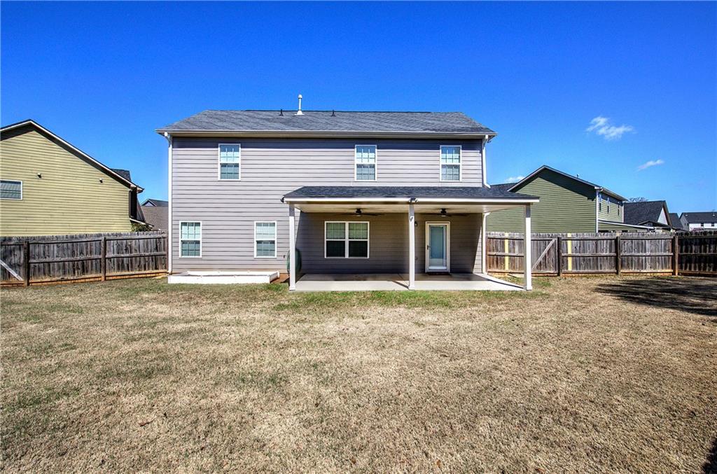 25 Winter Pointe Northwest Cartersville, GA 30121 - Photo 38 of 43 a front view of a house with a garden