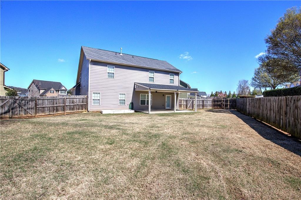 25 Winter Pointe Northwest Cartersville, GA 30121 - Photo 40 of 43 a front view of a house with a yard