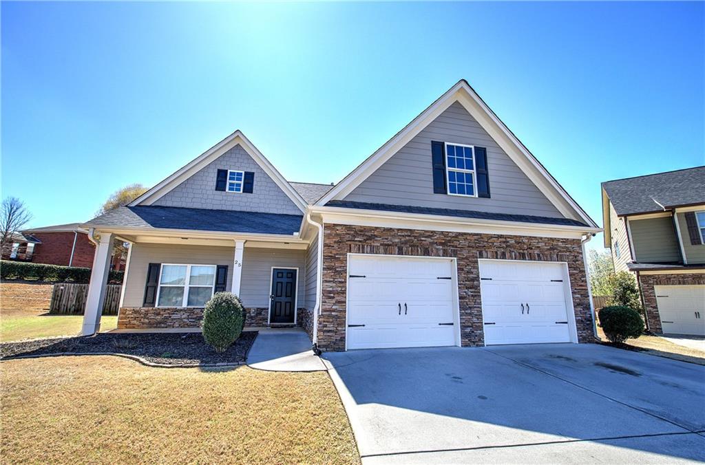 25 Winter Pointe Northwest Cartersville, GA 30121 - Photo 41 of 43 a view of a house with wooden floor and a fireplace