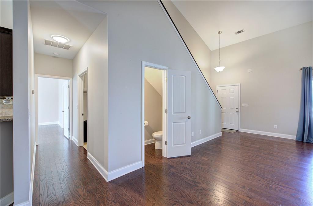 25 Winter Pointe Northwest Cartersville, GA 30121 - Photo 5 of 43 a view of a hallway with wooden floor