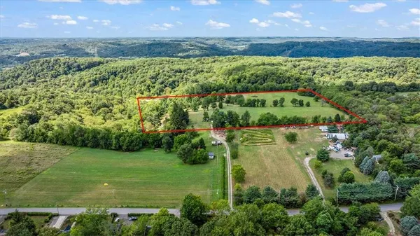 a bedroom with furniture and a chair