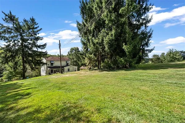a swimming pool with wooden fence