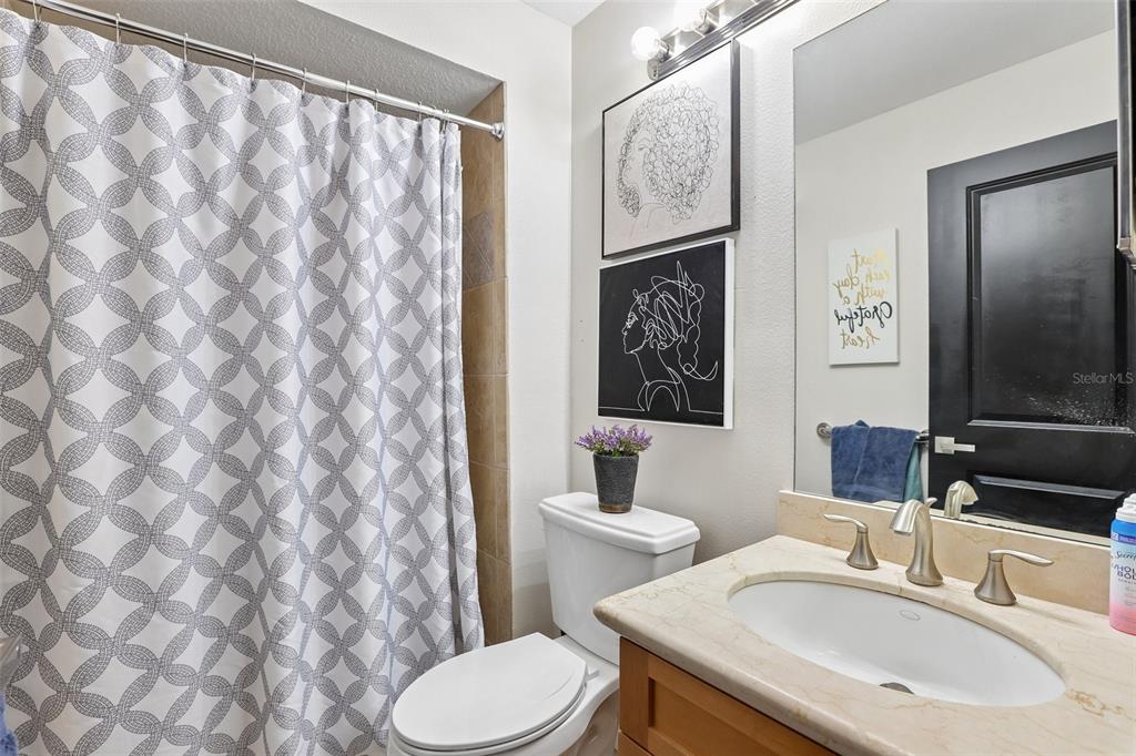 1525 Kestrel Way Brandon, FL 33511 - Photo 26 of 48 a bathroom with a sink toilet and mirror