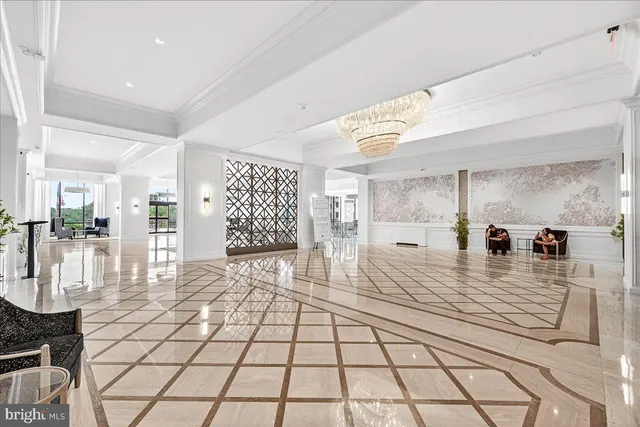 a view of a living room and kitchen