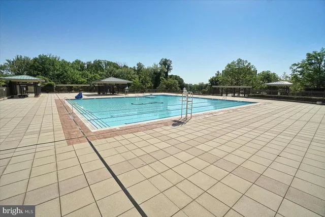 a view of an outdoor space and tennis court