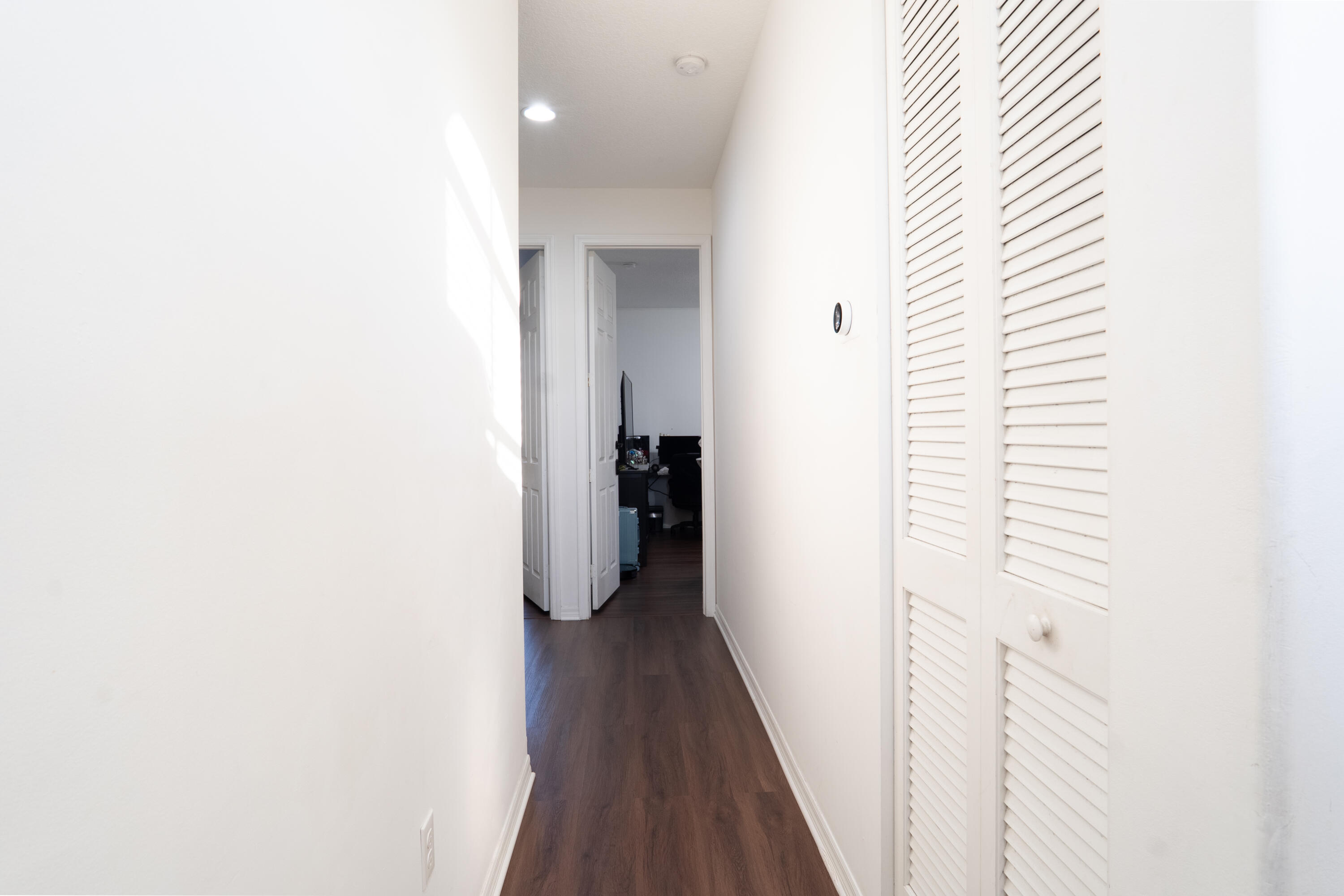 3573 Southwest 92nd Avenue Miramar, FL 33025 - Photo 12 of 24 a view of a hallway with wooden floor and staircase