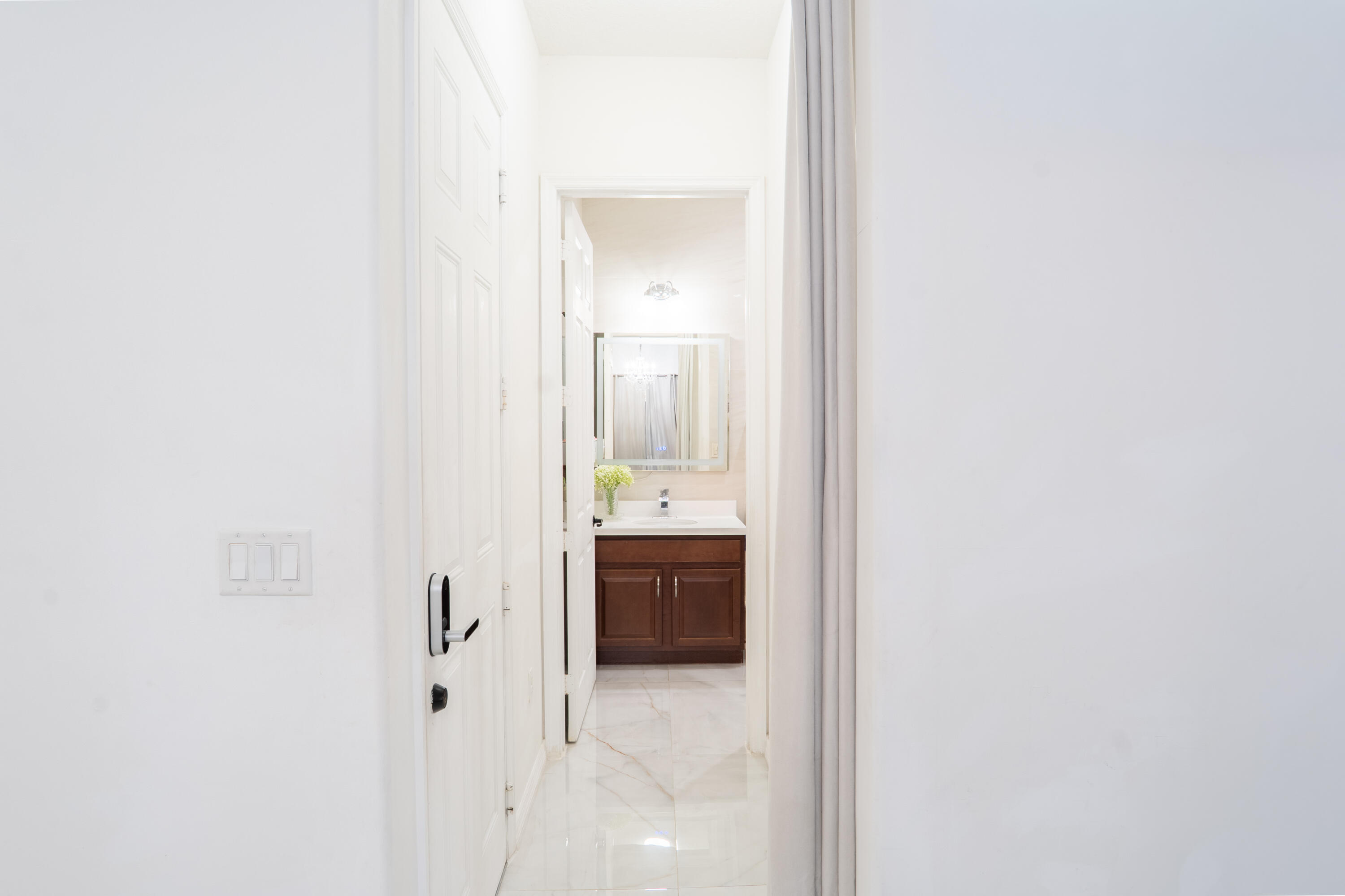 3573 Southwest 92nd Avenue Miramar, FL 33025 - Photo 16 of 24 a view of a bathroom from a hallway