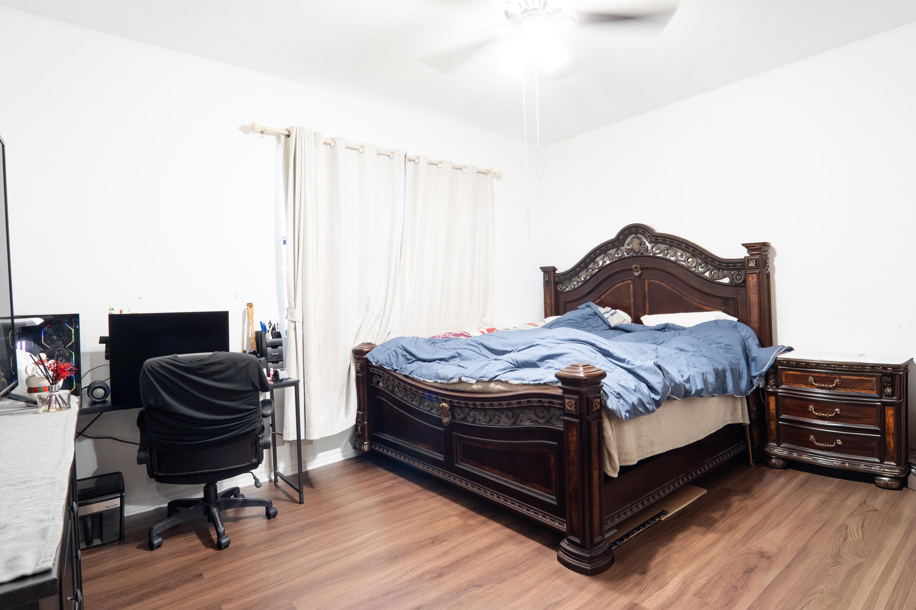 3573 Southwest 92nd Avenue Miramar, FL 33025 - Photo 18 of 24 a bedroom with a bed and a chair