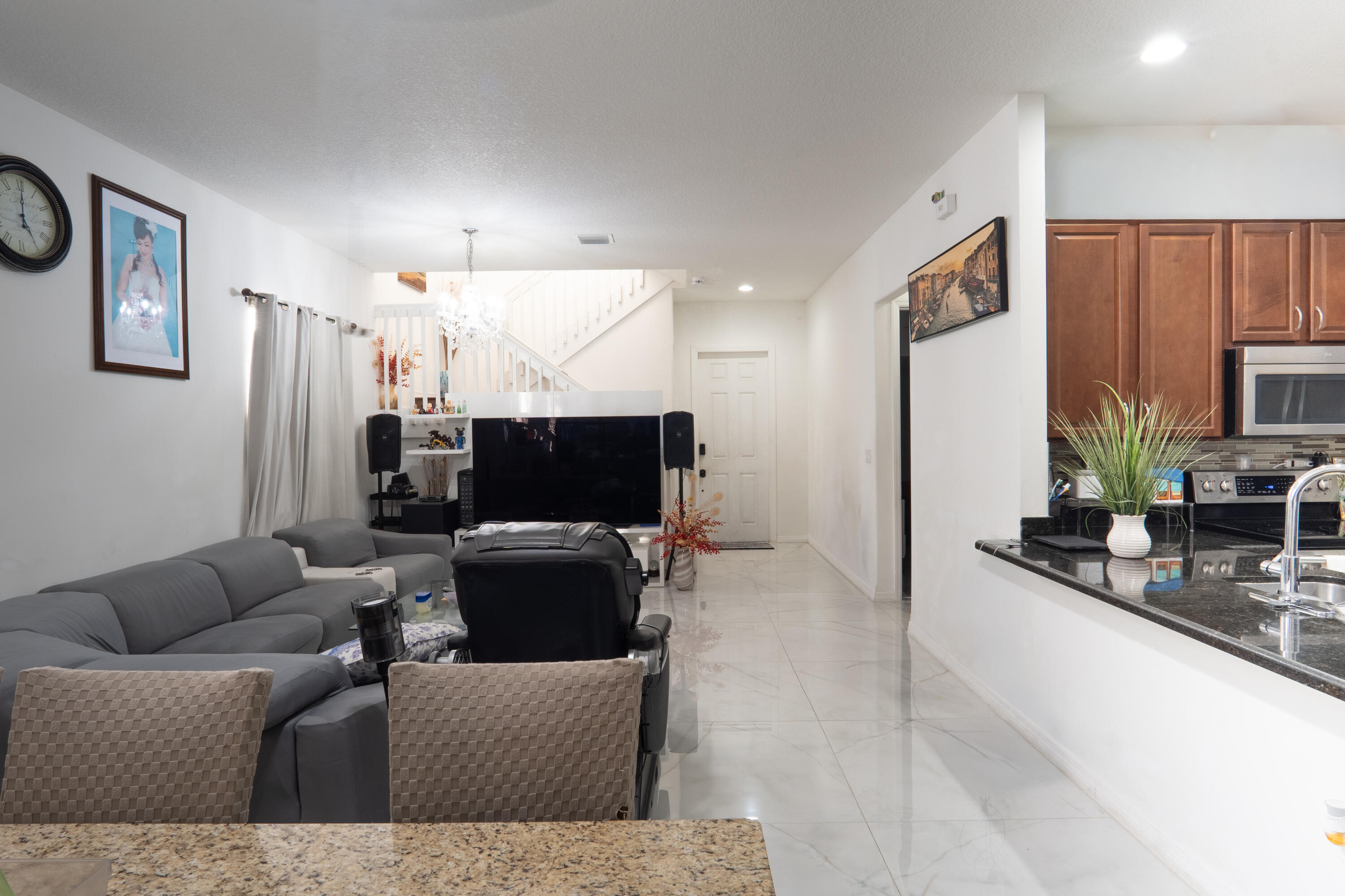 3573 Southwest 92nd Avenue Miramar, FL 33025 - Photo 2 of 24 a living room with furniture and a flat screen tv
