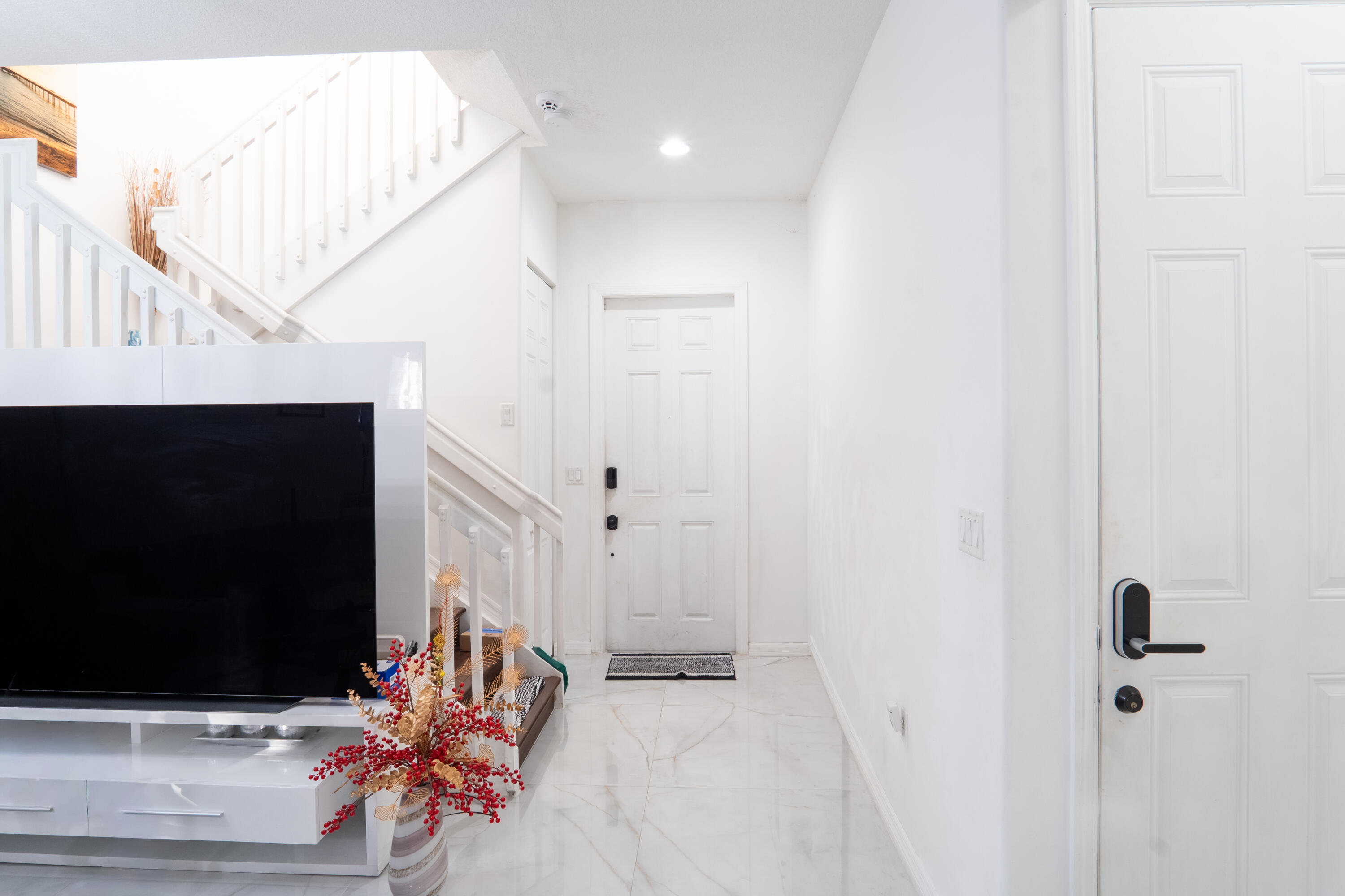 3573 Southwest 92nd Avenue Miramar, FL 33025 - Photo 3 of 24 a living room with furniture and a flat screen tv