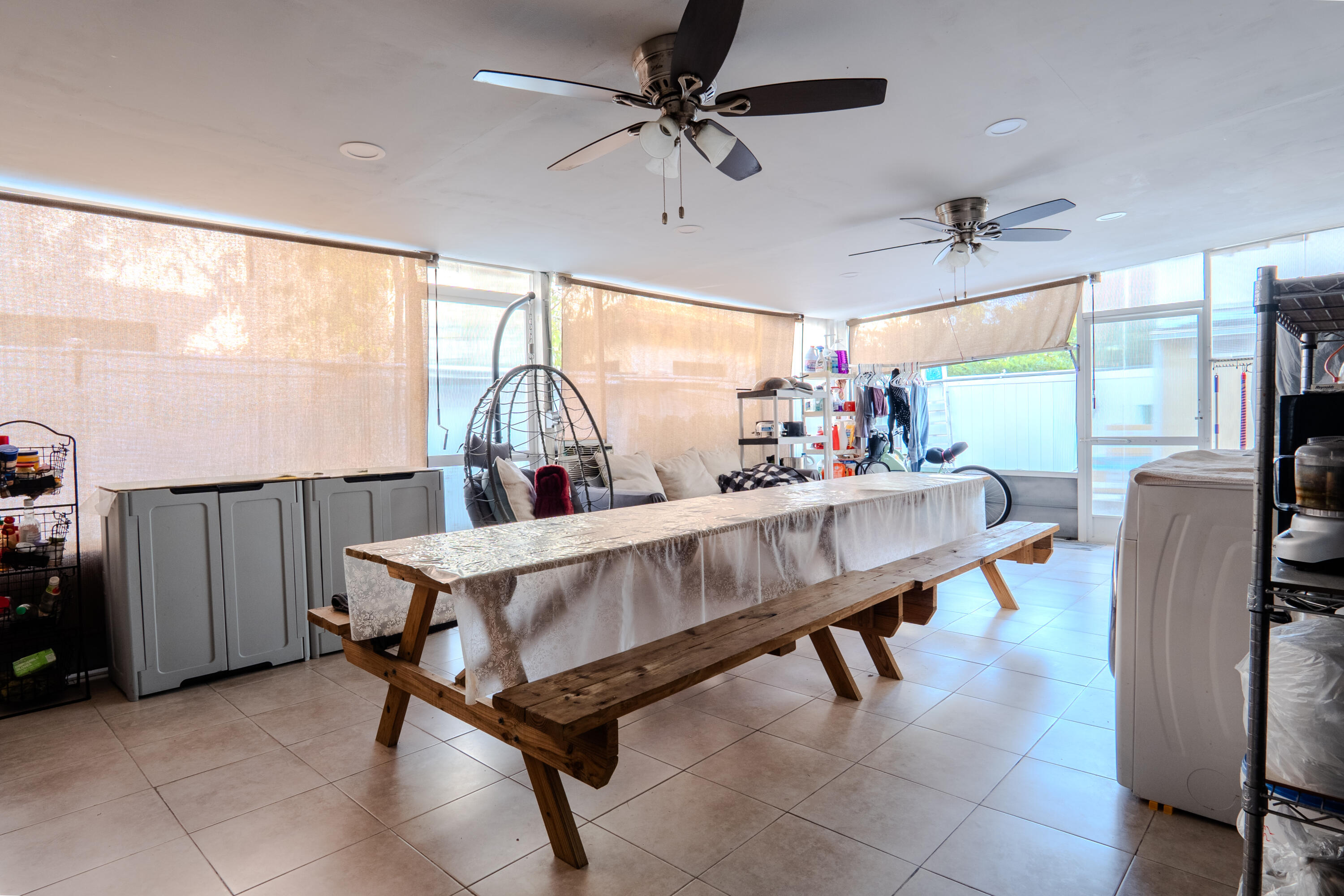 3573 Southwest 92nd Avenue Miramar, FL 33025 - Photo 5 of 24 a room with furniture a chandelier and a window