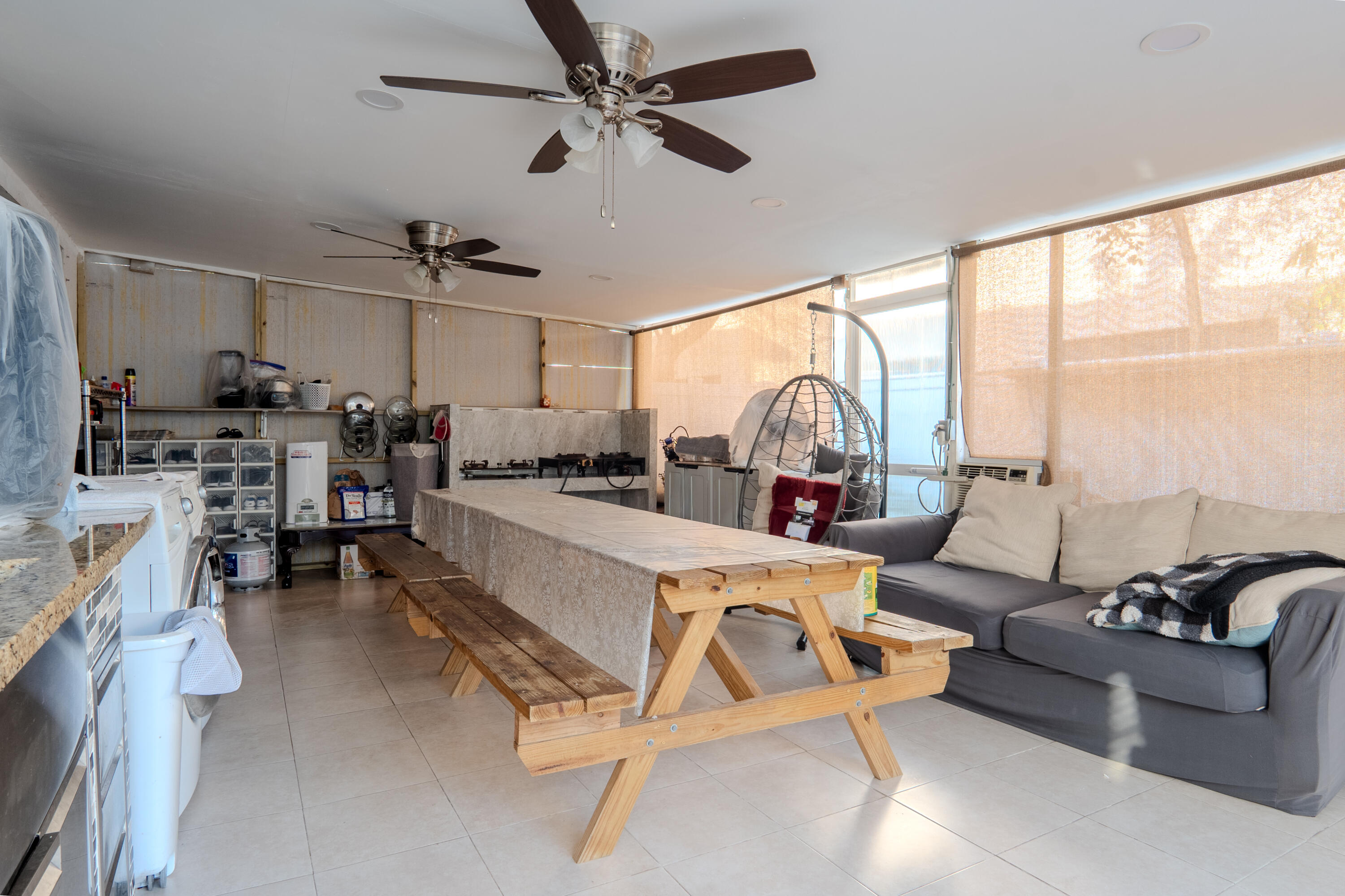 3573 Southwest 92nd Avenue Miramar, FL 33025 - Photo 6 of 24 a living room with furniture and a large window