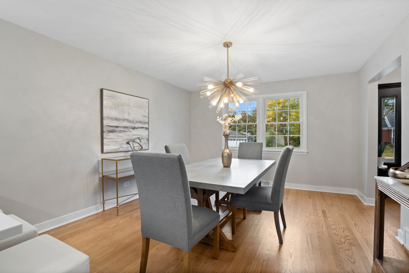 215 45th Street Western Springs, IL 60558 - Photo 17 of 46 a view of a dining room with furniture window and wooden floor