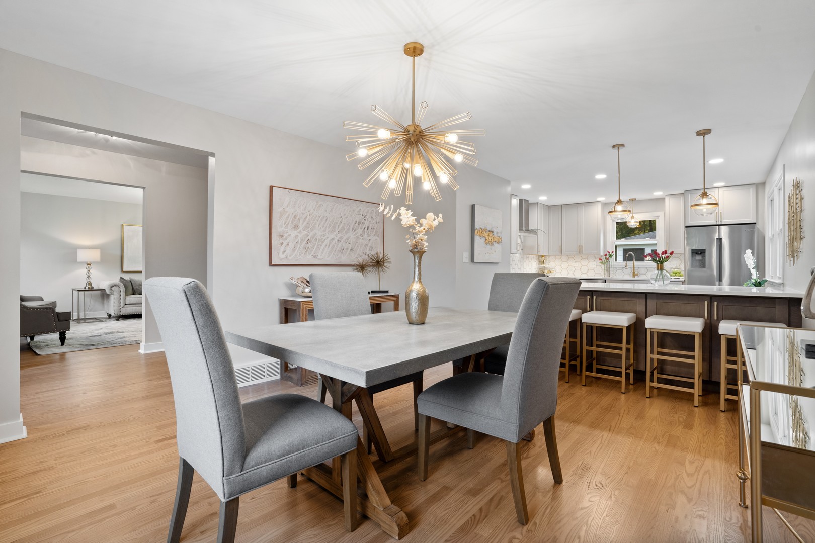 215 45th Street Western Springs, IL 60558 - Photo 18 of 46 a dining room with furniture a chandelier and wooden floor