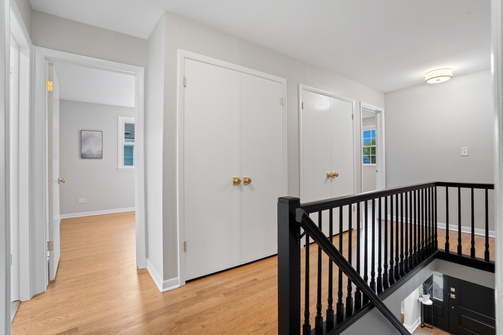 215 45th Street Western Springs, IL 60558 - Photo 24 of 46 a view of a hallway with entryway and wooden floor