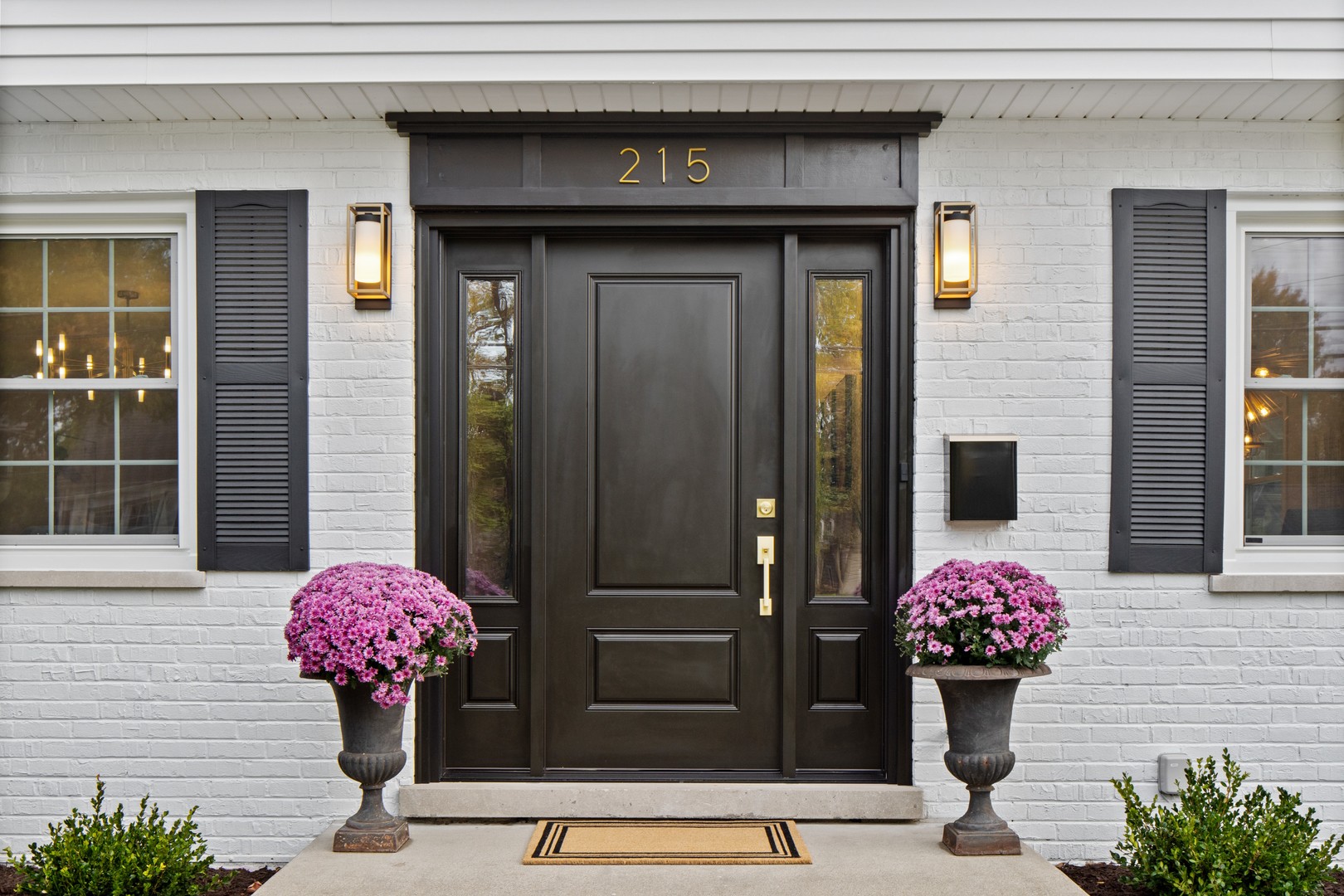 215 45th Street Western Springs, IL 60558 - Photo 3 of 46 a pink flowers in front of a house