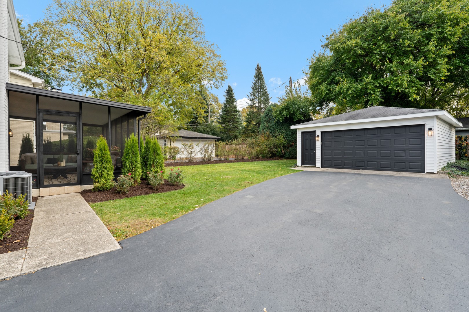 215 45th Street Western Springs, IL 60558 - Photo 43 of 46 a view of a house with garage and yard