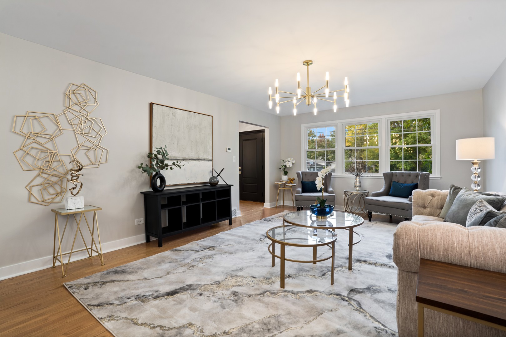 215 45th Street Western Springs, IL 60558 - Photo 8 of 46 a living room with furniture and a chandelier