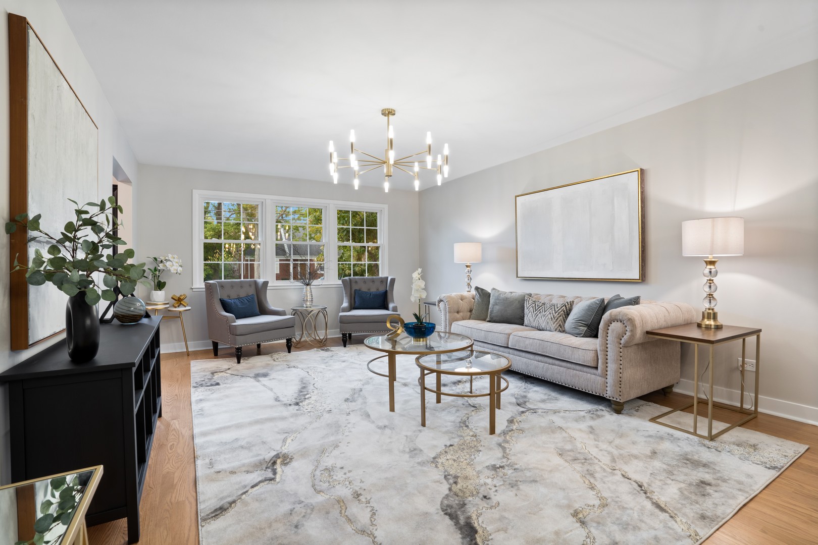 215 45th Street Western Springs, IL 60558 - Photo 10 of 46 a living room with furniture and a chandelier