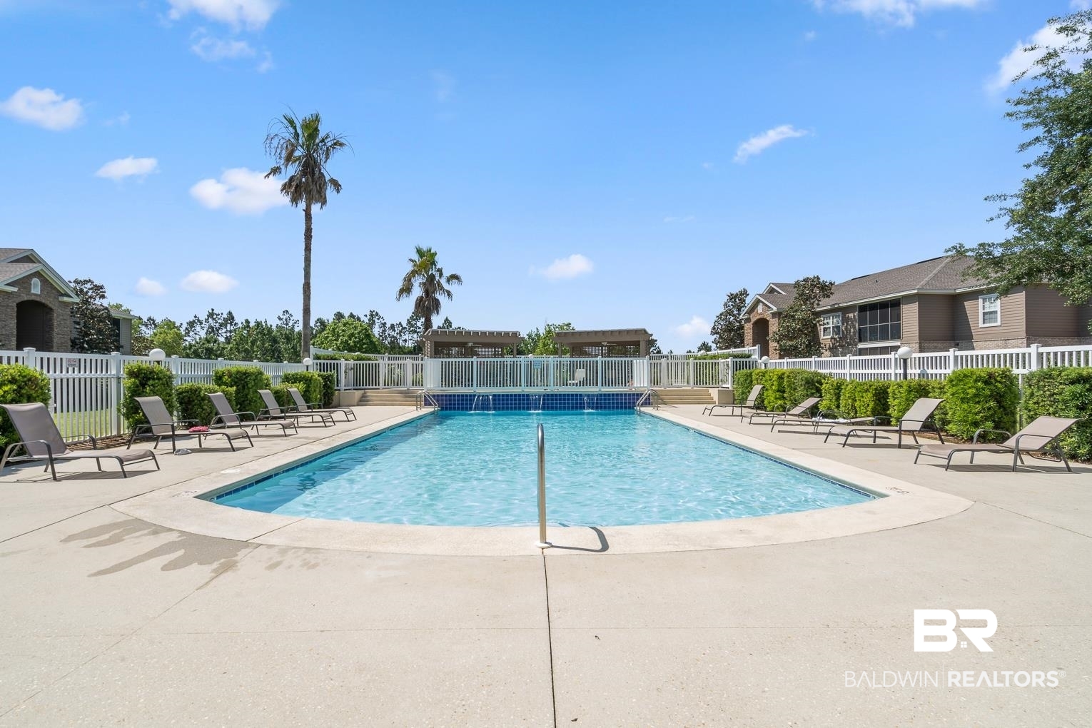 450 Park Avenue, Unit 112 Foley, AL 36535 - Photo 3 of 20 Community pool featuring a patio area