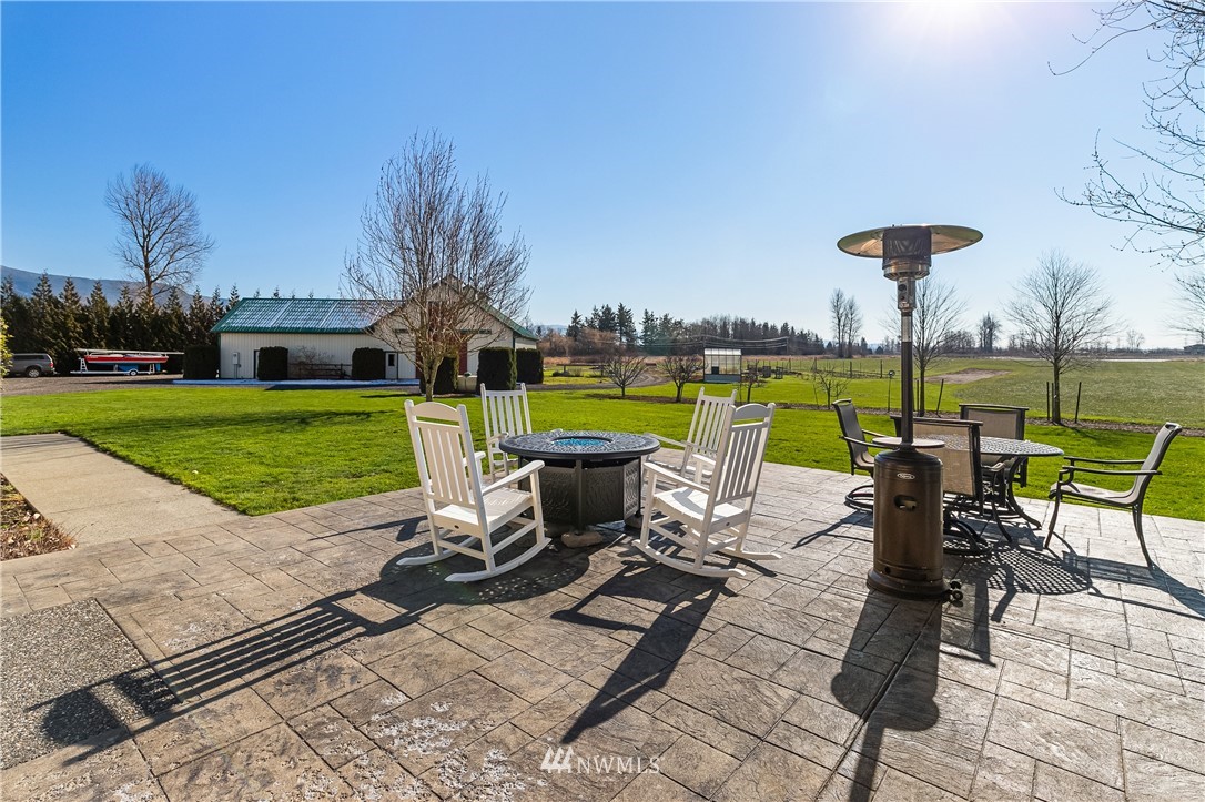 2693 Lindsay Road Everson, WA 98247 - Photo 11 of 40 a view of a swimming pool and lounge chairs