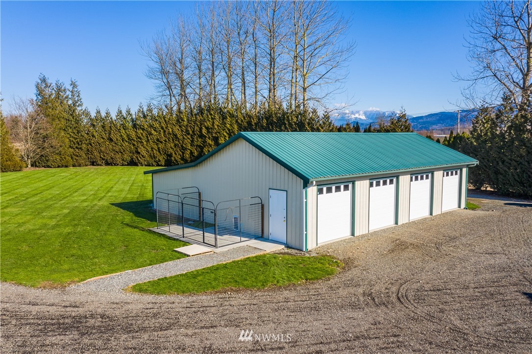 2693 Lindsay Road Everson, WA 98247 - Photo 8 of 40 a view of a house with a yard and potted plants
