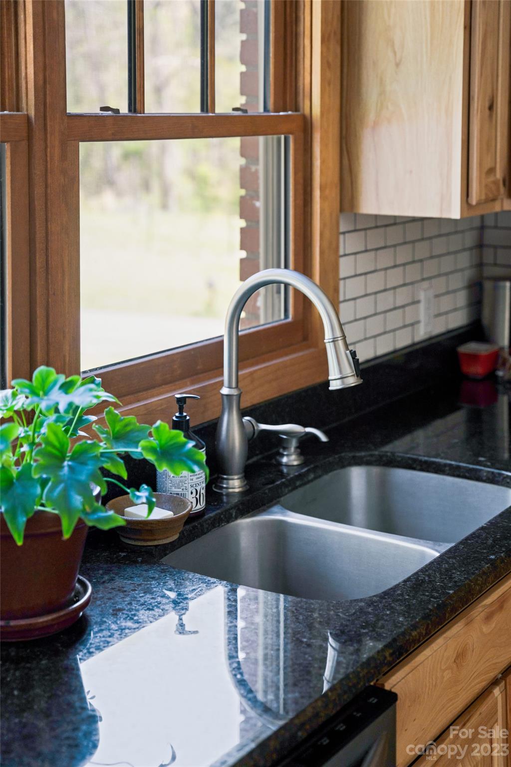 241 Sandy Mush Road Marshall, NC 28753 - Photo 19 of 46 a kitchen with a sink and a window