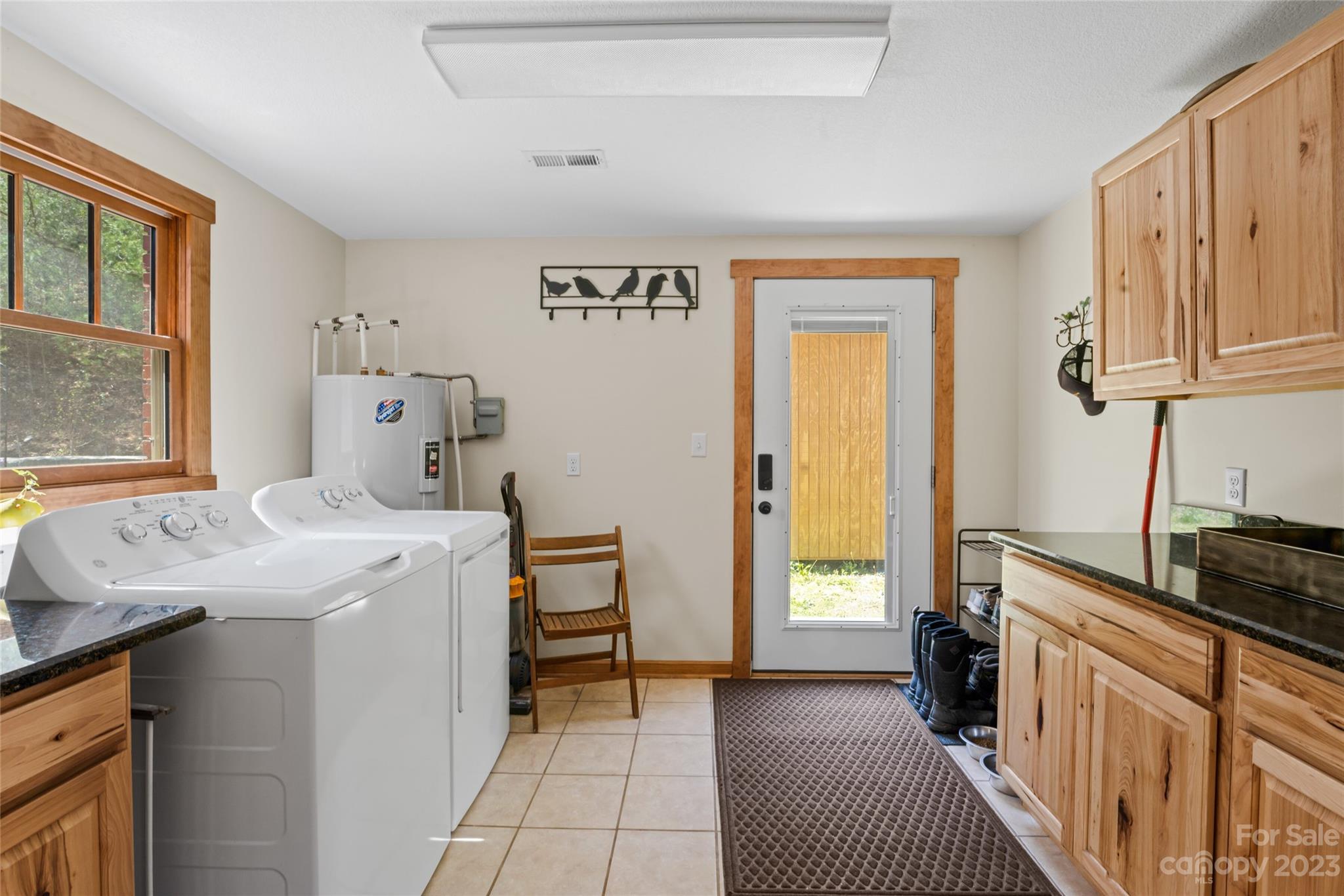 241 Sandy Mush Road Marshall, NC 28753 - Photo 33 of 46 a kitchen with a sink a stove and a refrigerator