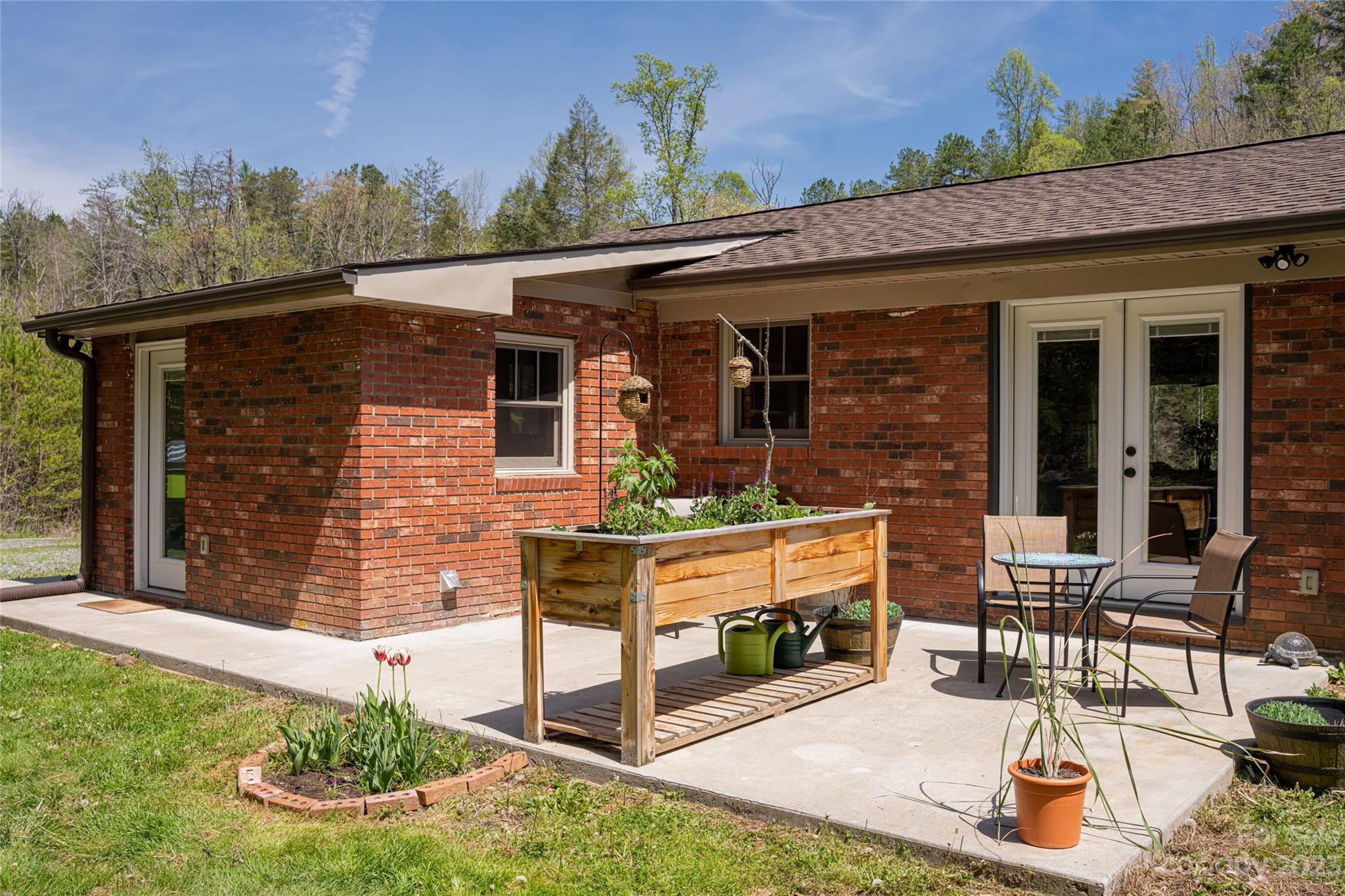 241 Sandy Mush Road Marshall, NC 28753 - Photo 35 of 46 a front view of a house with garden