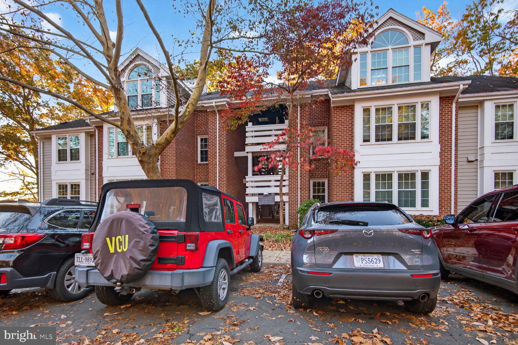 11116 Beaver Trail Court, Unit 11116 Reston, VA 20191 - Photo 23 of 28 a front view of a house with parking space