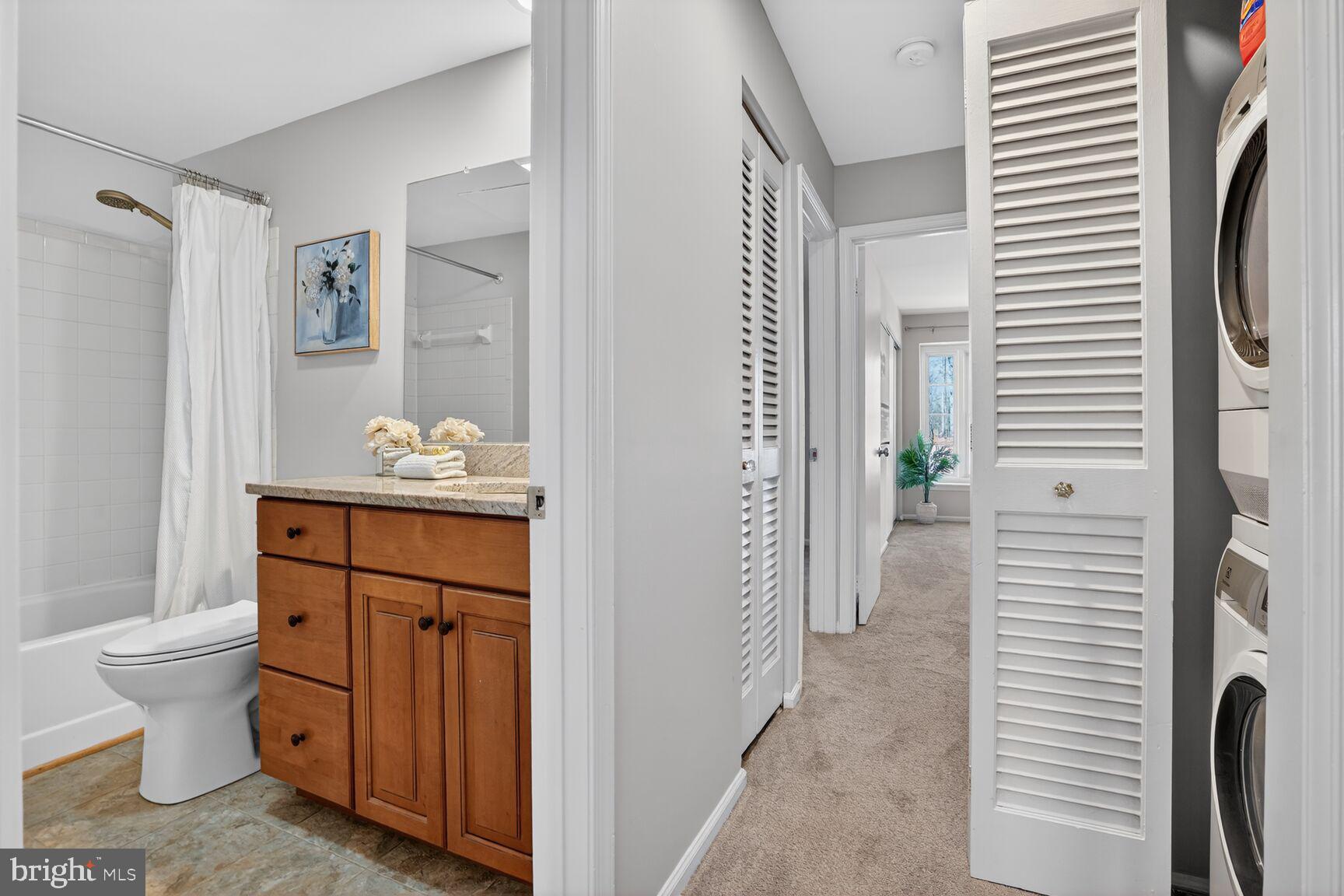 11116 Beaver Trail Court, Unit 11116 Reston, VA 20191 - Photo 24 of 28 a bathroom with a sink toilet and shower
