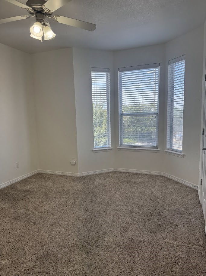 1198 Jones-Butler Road, Unit 1702 College Station, TX 77840 - Photo 8 of 19 a view of an empty room with a window