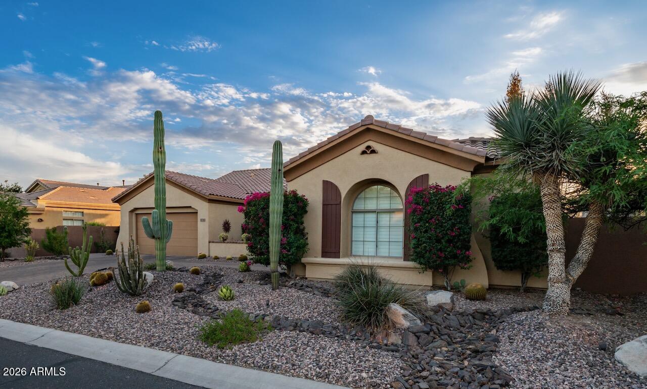 40316 North Lytham Way Phoenix, AZ 85086 - Photo 61 of 66 a front view of a house with garden