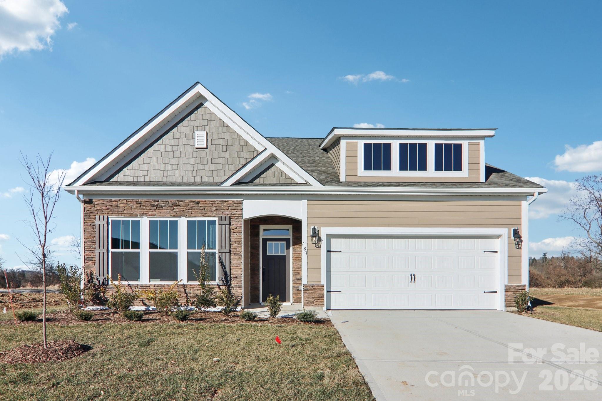201 Piney Wds Road Fletcher, NC 28732 - Photo 1 of 47 a front view of a house with a yard
