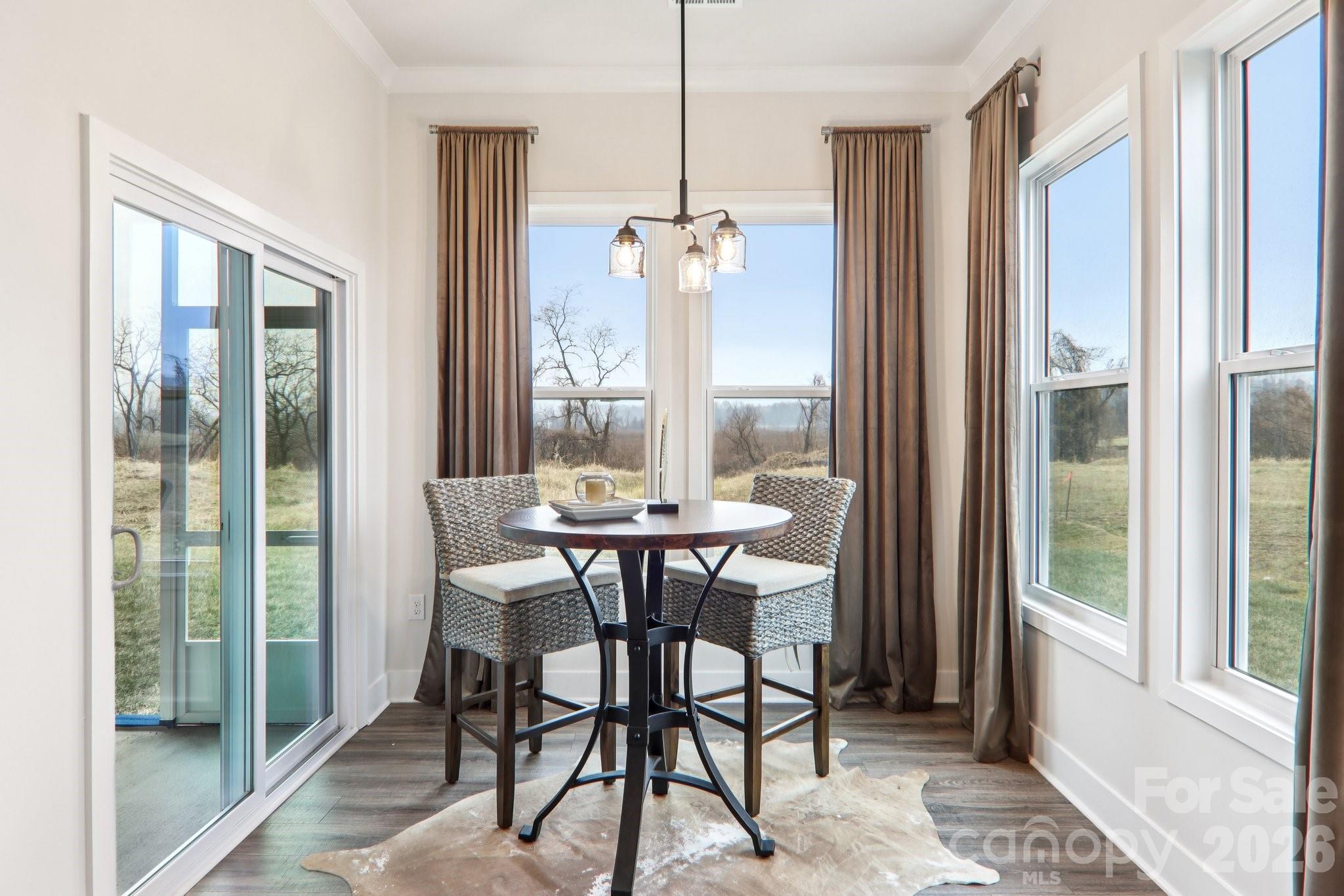 201 Piney Wds Road Fletcher, NC 28732 - Photo 24 of 47 a view of a dining room with furniture window and outside view