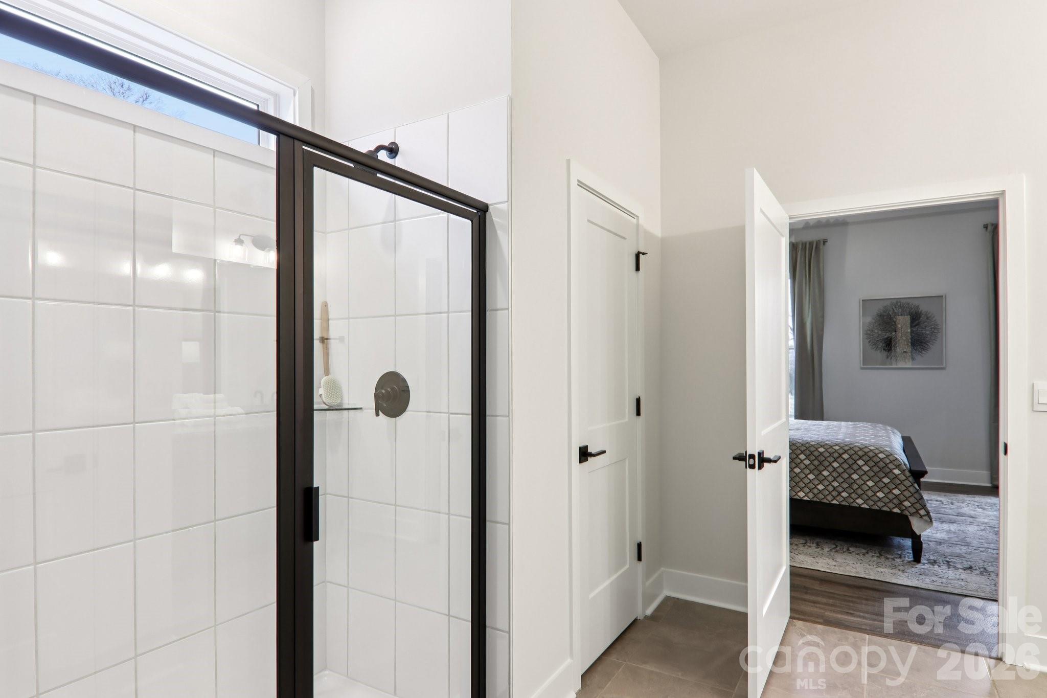 201 Piney Wds Road Fletcher, NC 28732 - Photo 32 of 47 a en suite bathroom with a shower