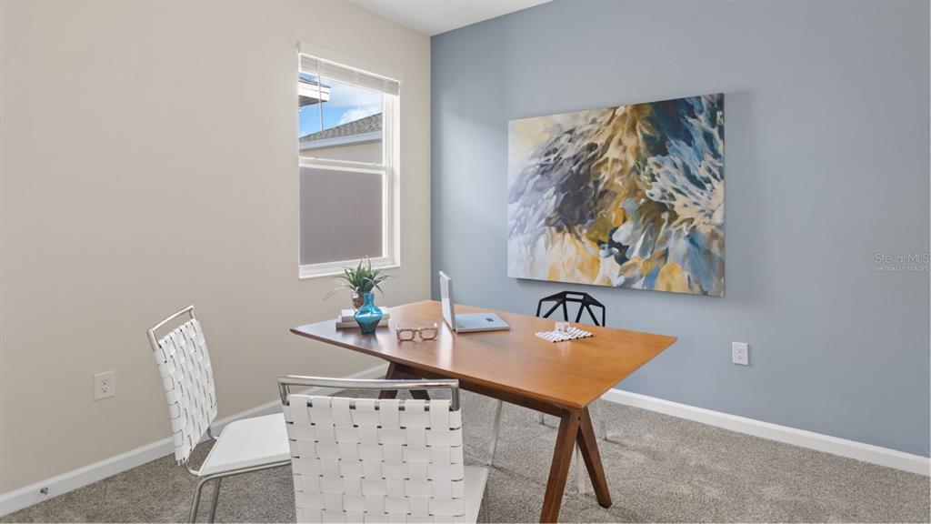 782 Rivington Avenue DeBary, FL 32713 - Photo 15 of 25 a dining room with furniture and window