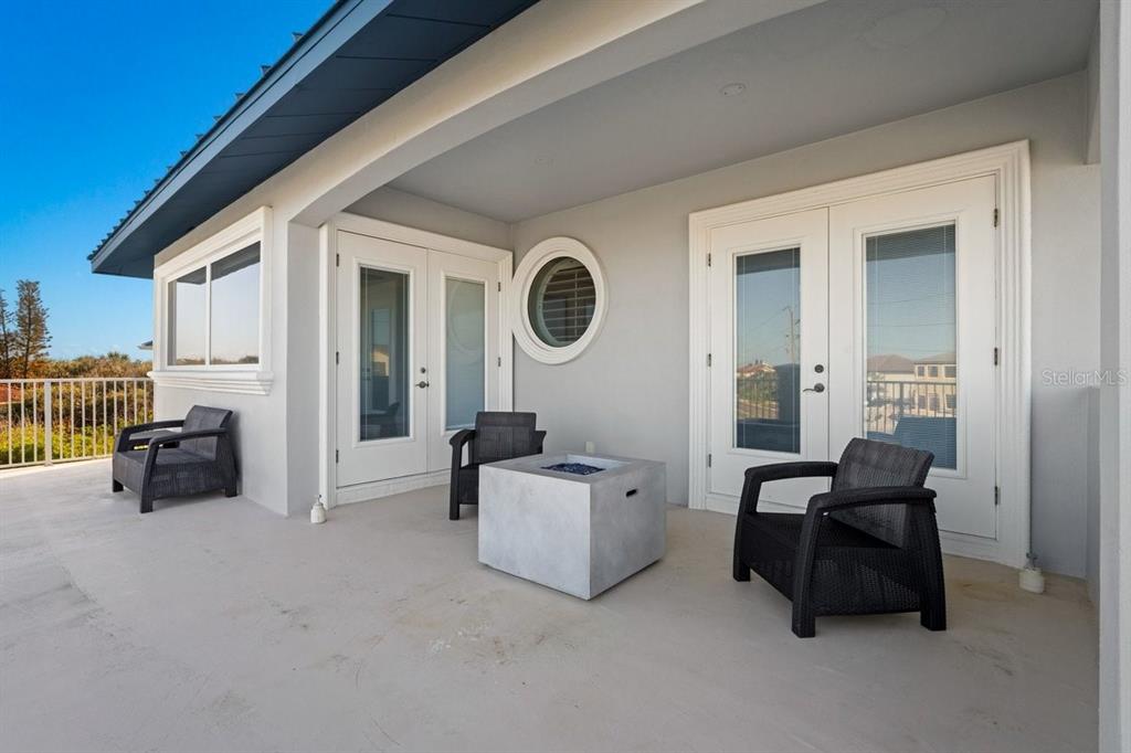 2 Mar Azul North Ponce Inlet, FL 32127 - Photo 73 of 98 a living room with furniture and a large window