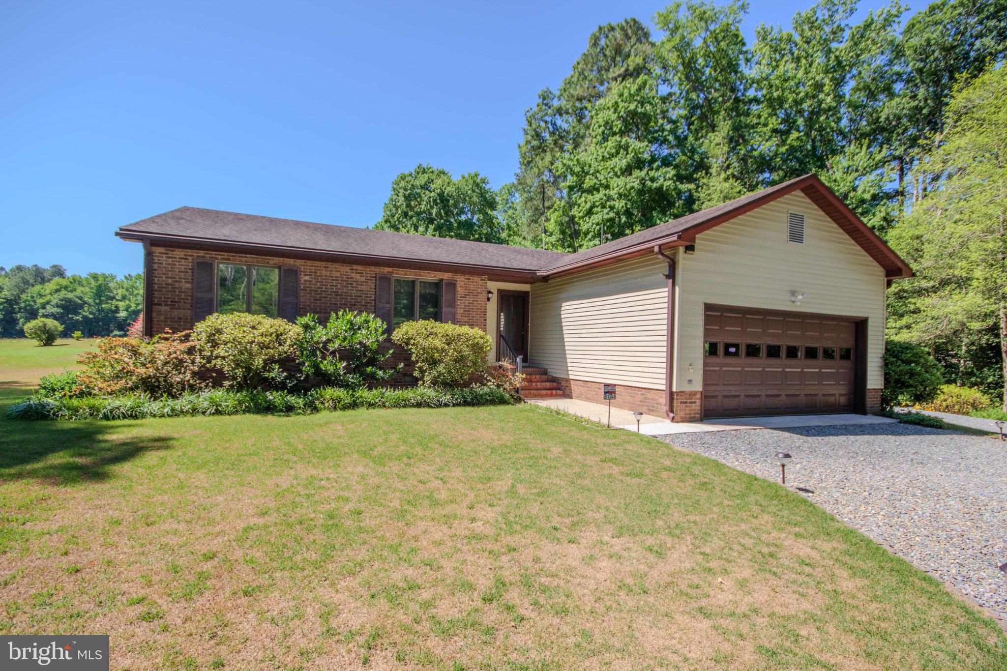 31749 Morris Leonard Road Parsonsburg, MD 21849 - Photo 2 of 40 Charming home nestled in lush greenery.