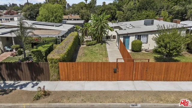 a view of a room with wooden walls