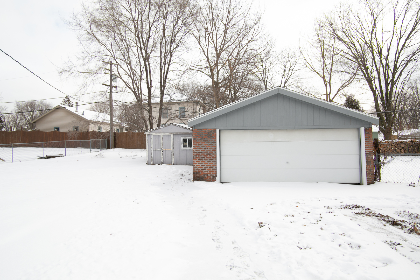 15039 Copter Lane Romeoville, IL 60446 - Photo 3 of 17 a view of a house with snow on the road